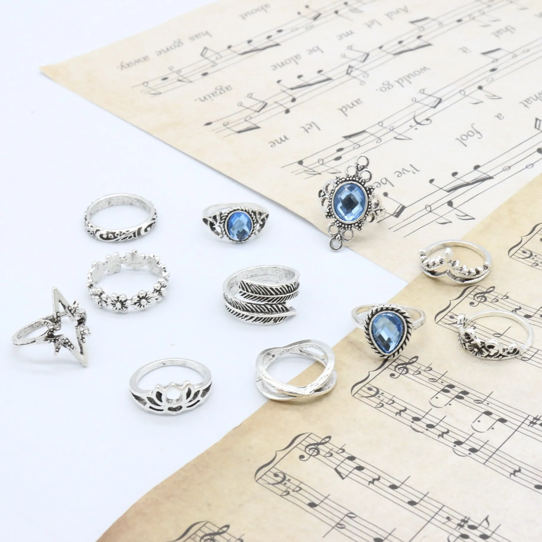 Silver Eleven Piece Star Floral Multi Designs Ring Set