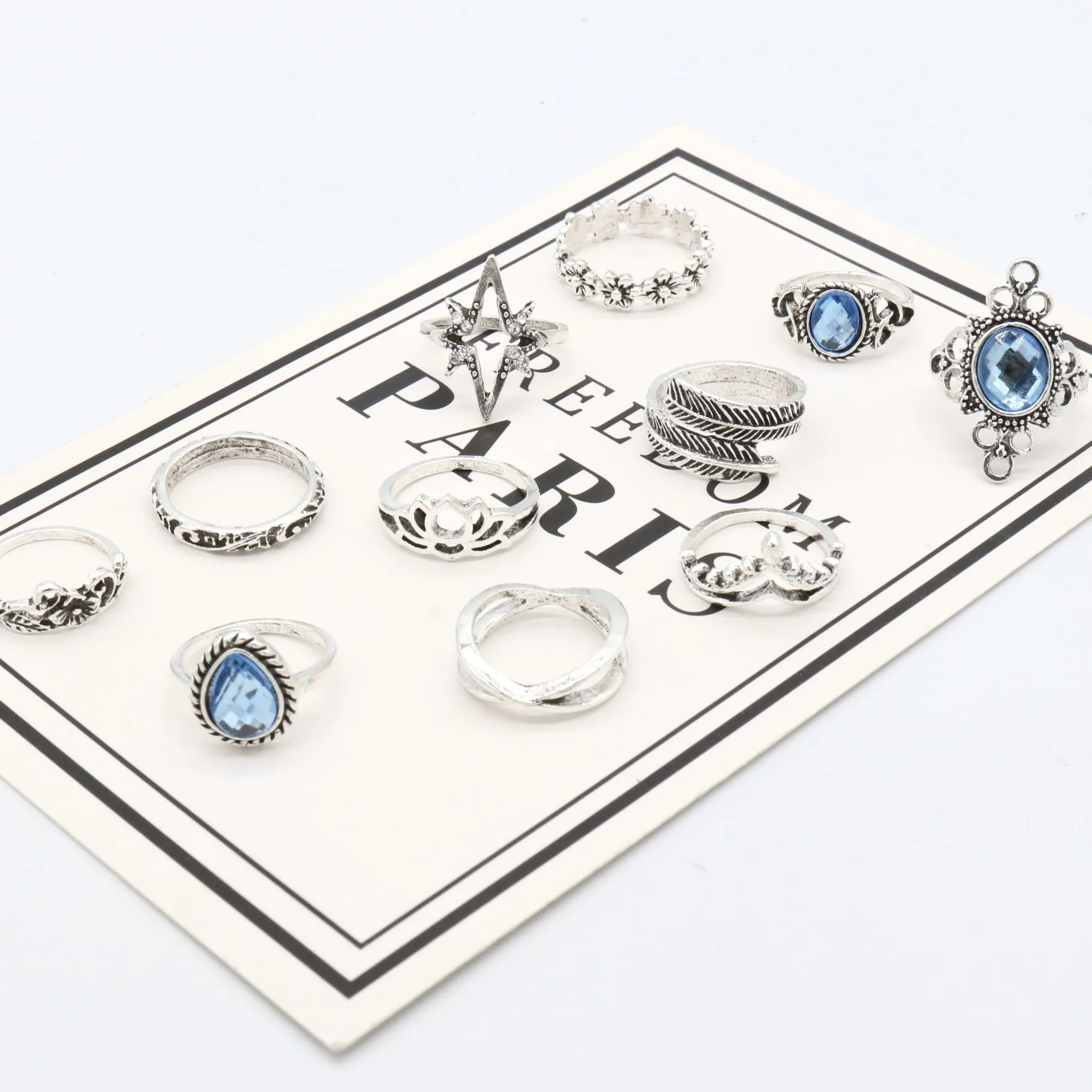 Silver Eleven Piece Star Floral Multi Designs Ring Set